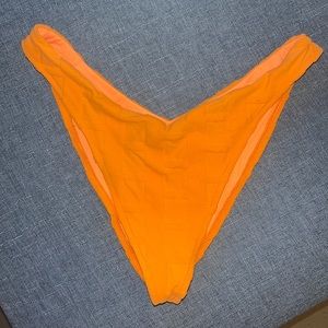 Frankie’s Bikinis x Naomi Orange bikini bottom